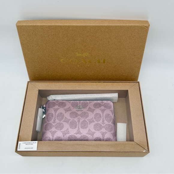 Coach Handbags - Coach Boxed Corner Zip Wristlet In Signature Canvas With Charms Silver Pink Rose